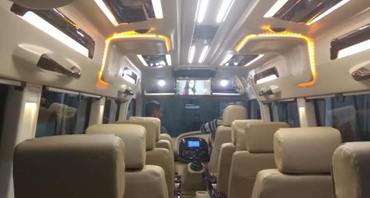 dehradun tour by 12 seater deluxe 1x1 tempo traveller