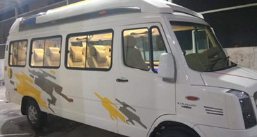 dehradun tour by 11 seater deluxe 1x1 tempo traveller