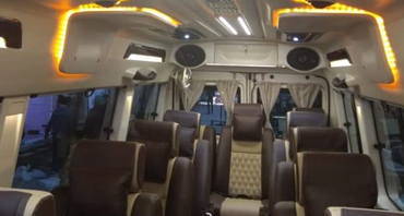 dehradun tour by 12 seater deluxe 1x1 tempo traveller