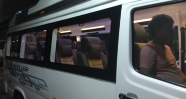 dehradun tour by 12 seater deluxe 1x1 tempo traveller