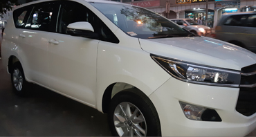 dehradun yatra tour by 8 seater innova crysta car